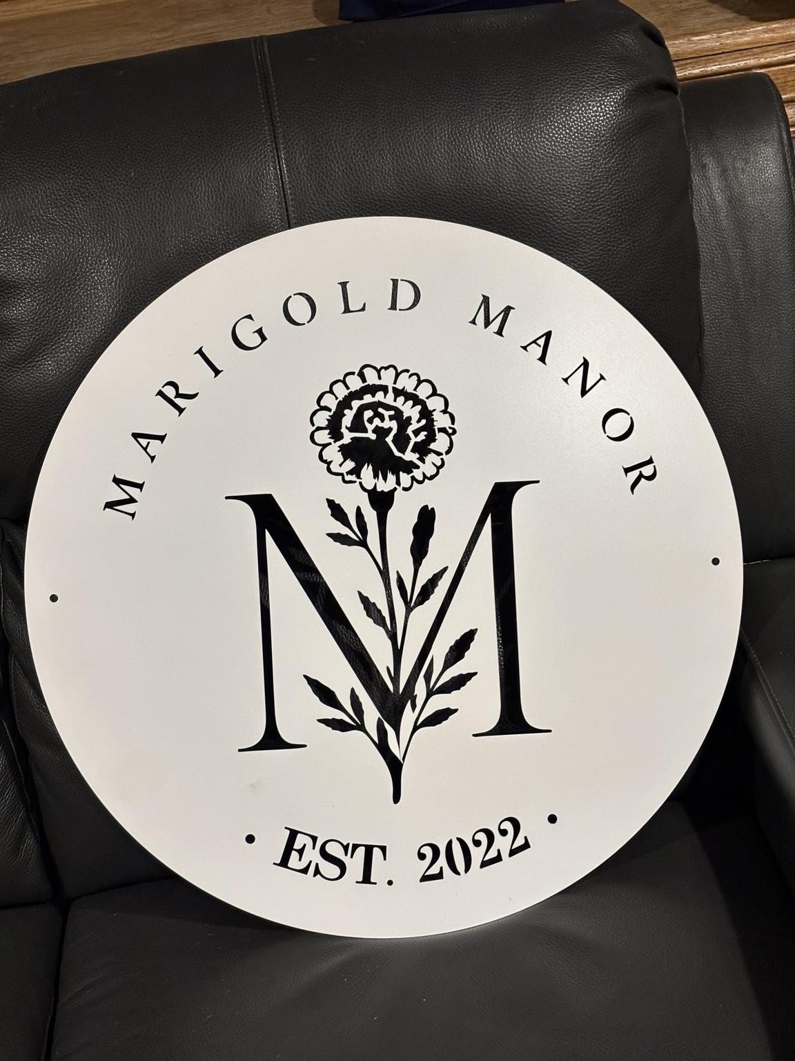 White Marigold Manor personalized round metal sign