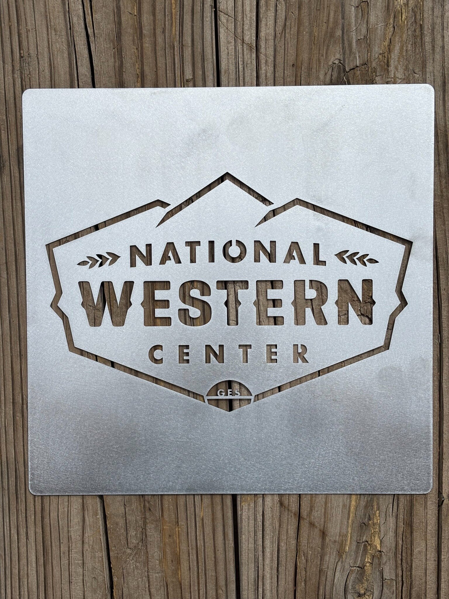 Large precision-cut National Western Center galvanized steel stencil